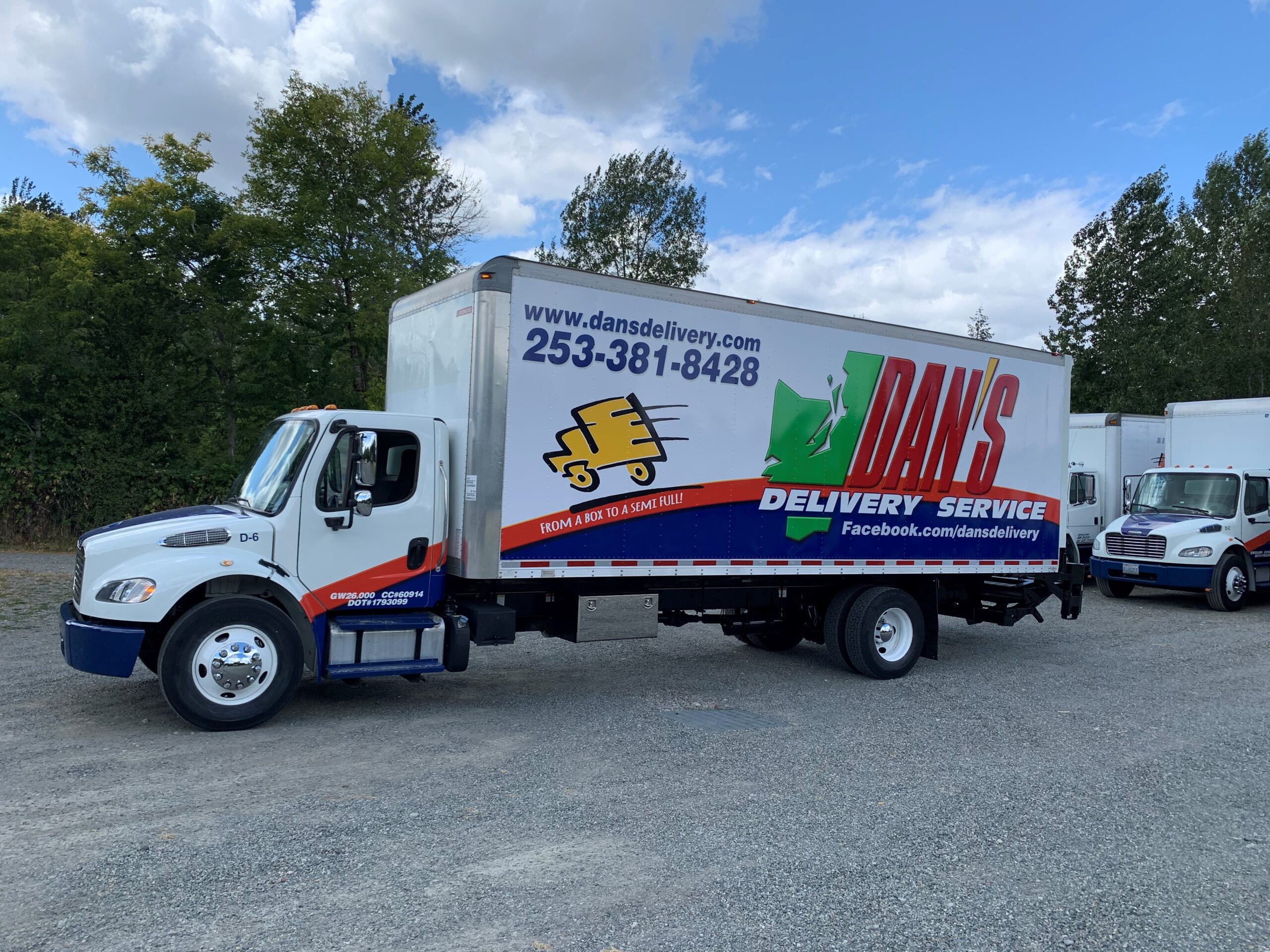 Countering the 2026 Cargo Theft Surge: The Security Benefits of No-Transload Shipping Photo of a Dan's Delivery Truck parked in a lot | Cargo theft