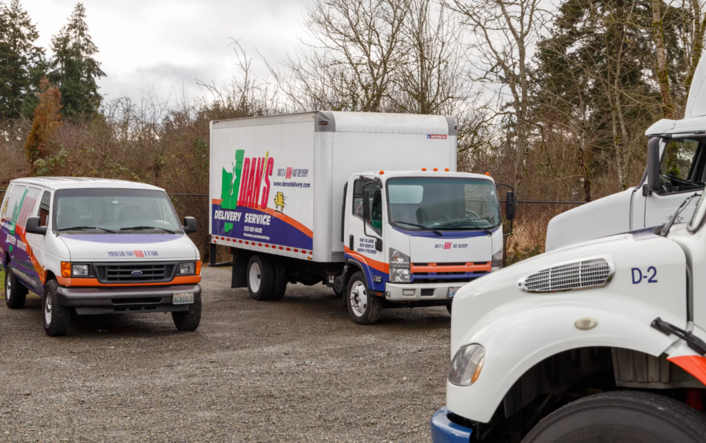 Avoiding Summer Slack: How to Navigate LTL Freight Carrier Delays in June fleet of Dan's delivery trucks | LTL freight carrier delays