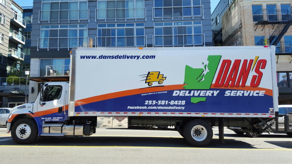 Avoiding Summer Slack: How to Navigate LTL Freight Carrier Delays in June Dan's Delivery truck parked outside a building